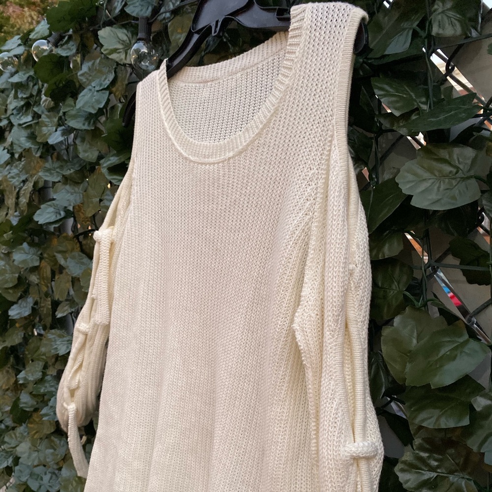 Knitted off shoulder sweater